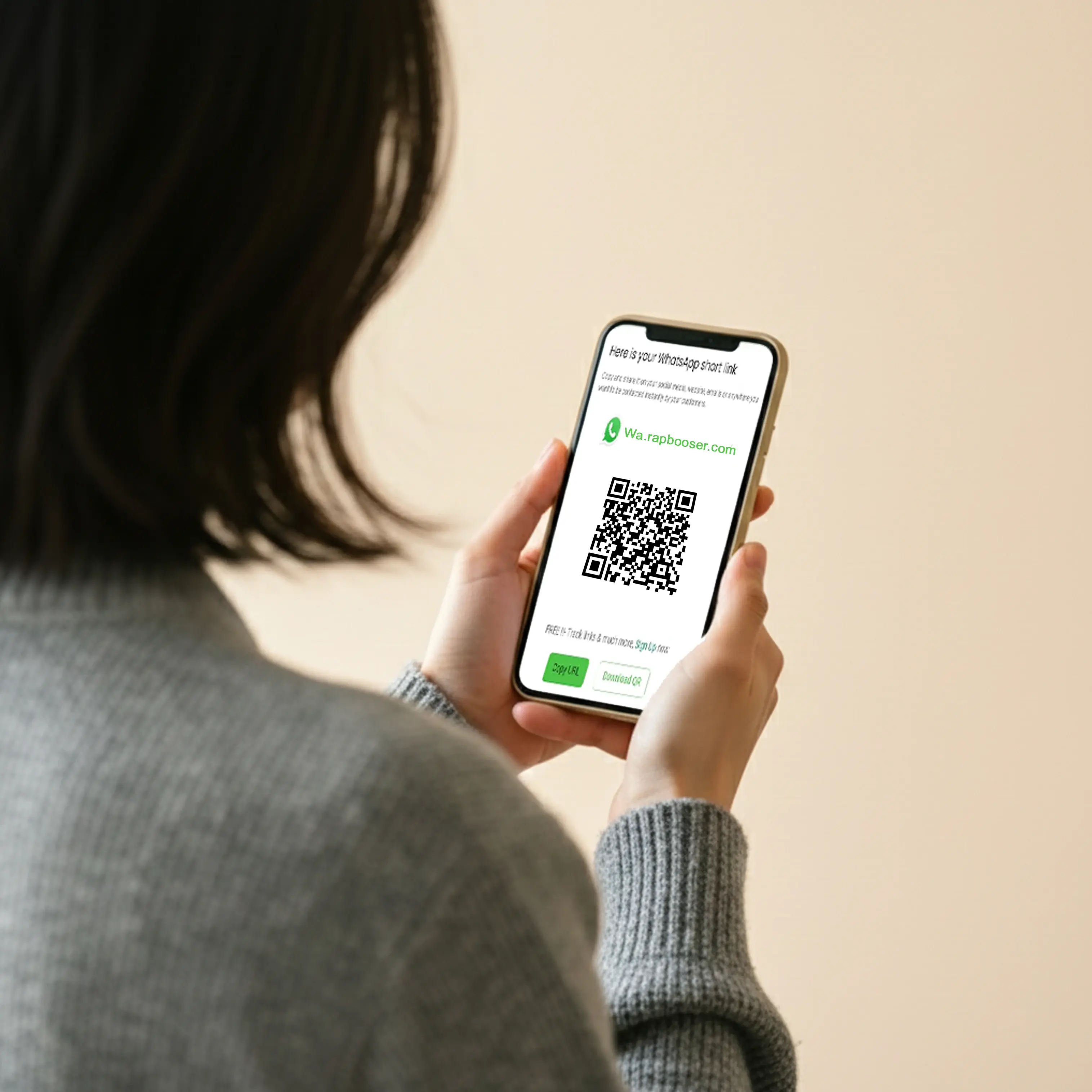 Person scanning a WhatsApp QR code with their phone to start a chat instantly